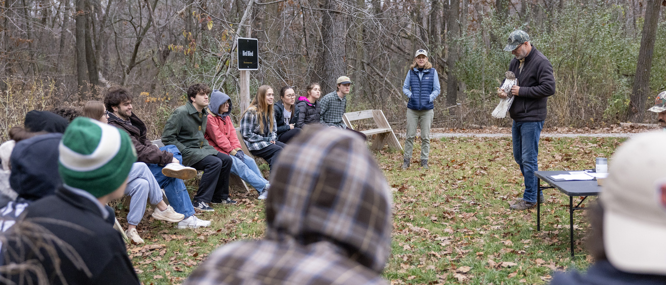 students doing fieldwork learning about bird banding
