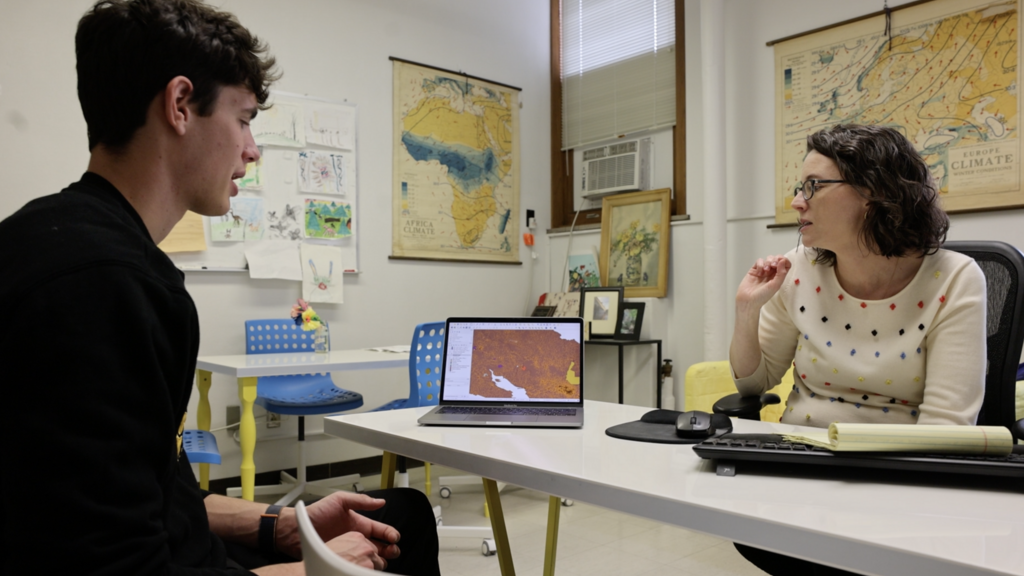 student and aculty discussing project
